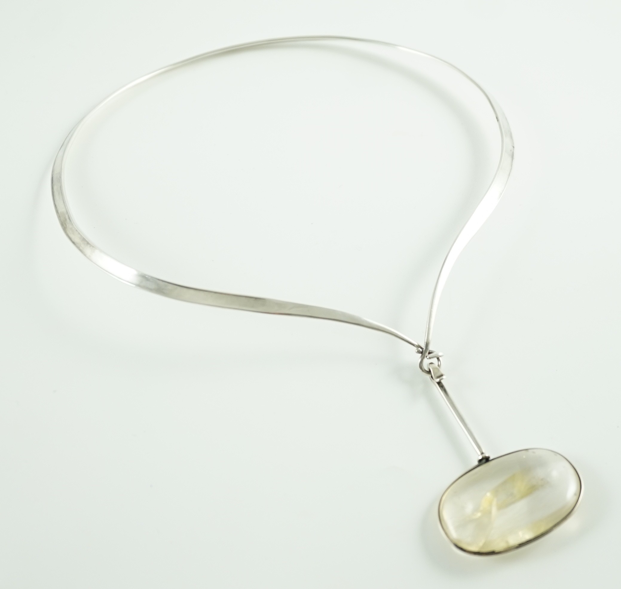 A Vivienne Torun for Georg Jensen Danish sterling silver and rutilated oval quartz set pendant necklace